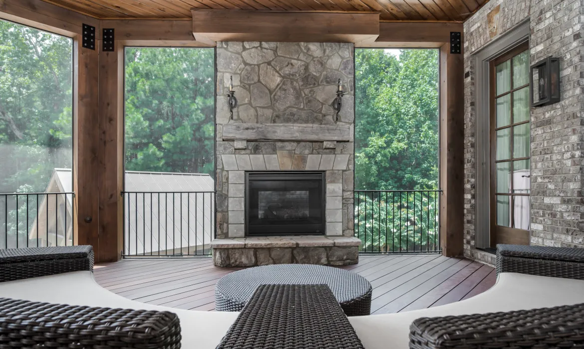 Retractable screens on a mountain cabin porch with scenic views