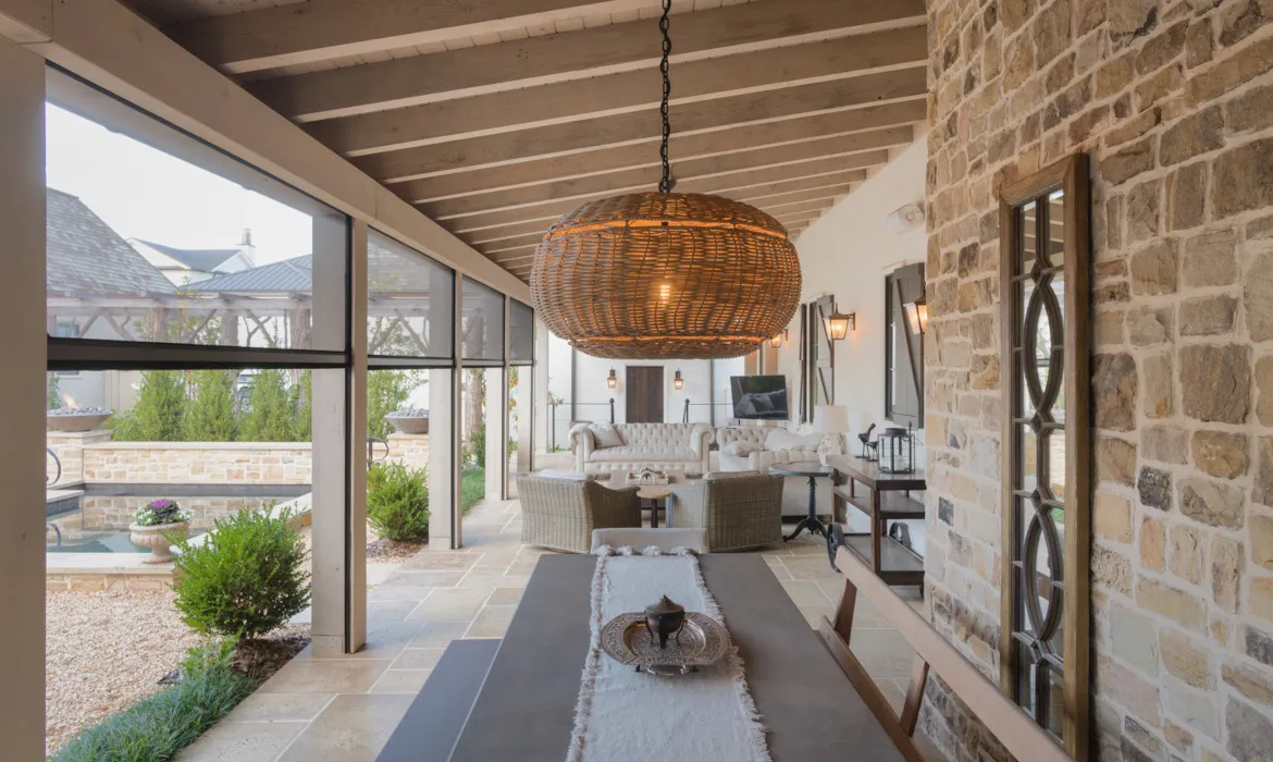 Motorized screens installed on a covered outdoor living area