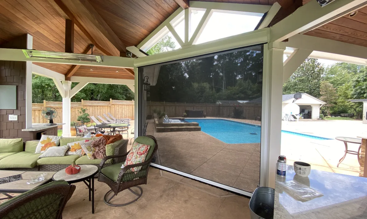 Retractable screens looking over pool