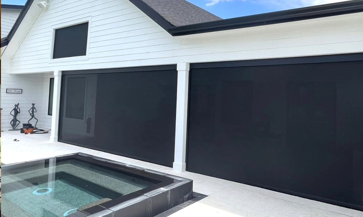 retractable solar shades on porch overlooking pool