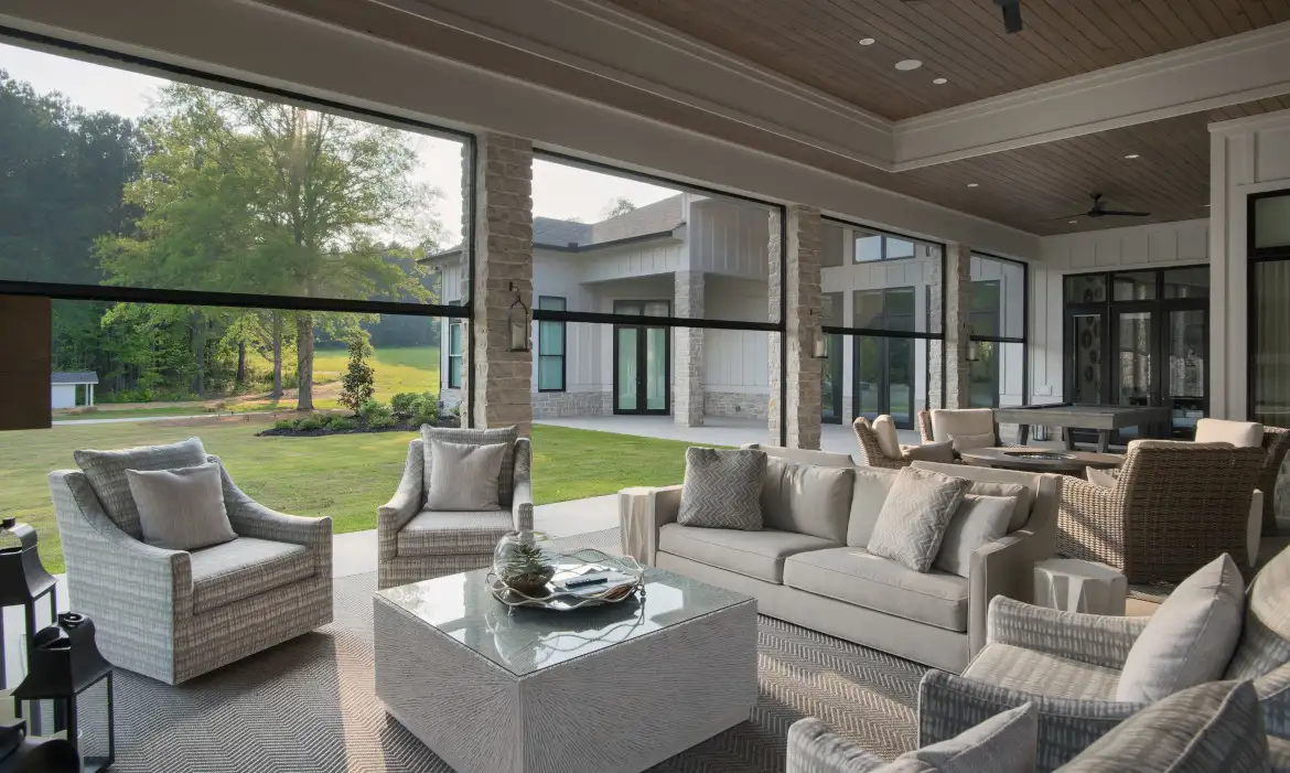 outdoor living area with motorized screens