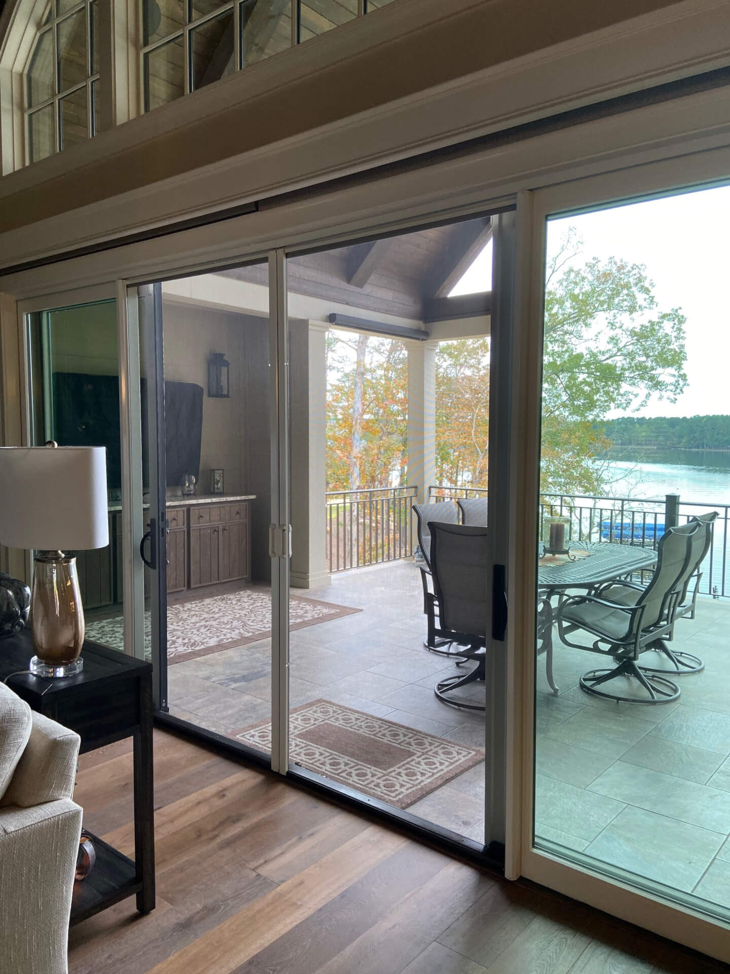 Wide retractable screen system installed at a residential patio doorway