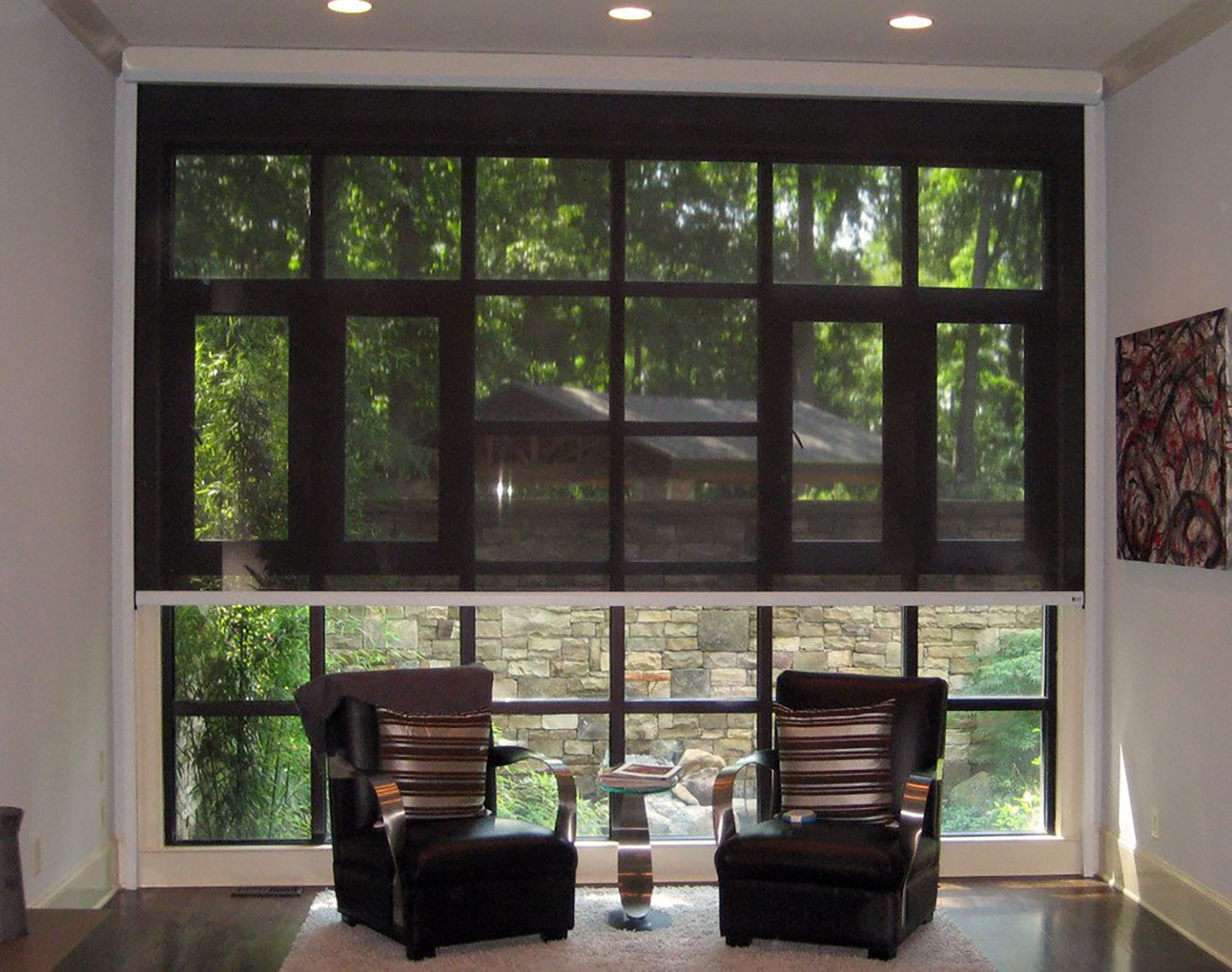 Dark solar shade covering a residential French door opening